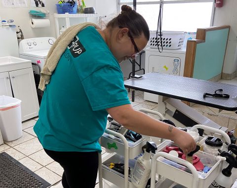 An LCS Participant is Getting Things Ready for a Dog Bath at her TWE!